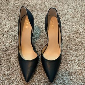 Black pointed toe pumps